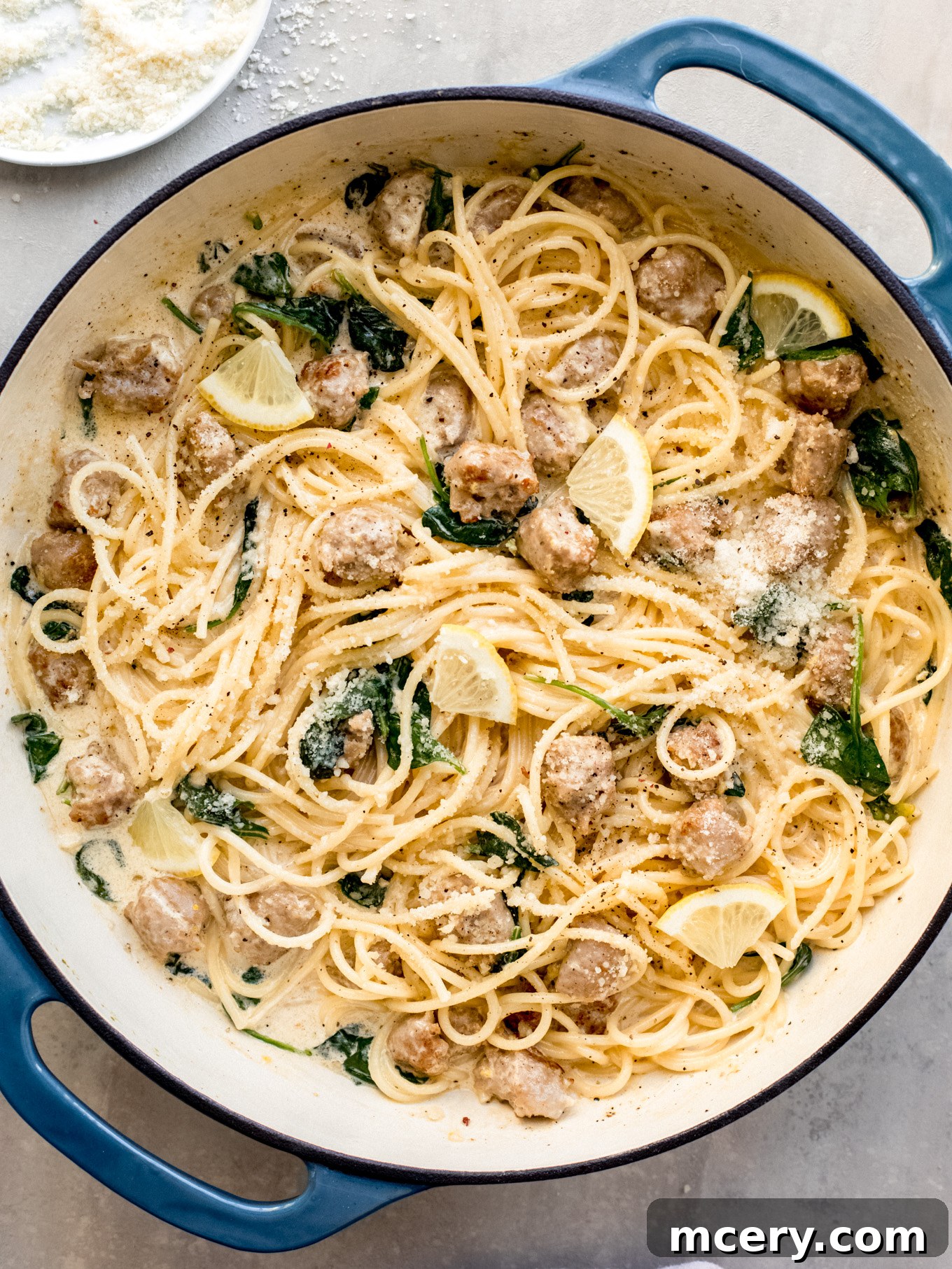 Bright Lemon Sausage Pasta 2 Creamy Lemon Sausage Pasta, garnished with fresh herbs, ready to be served