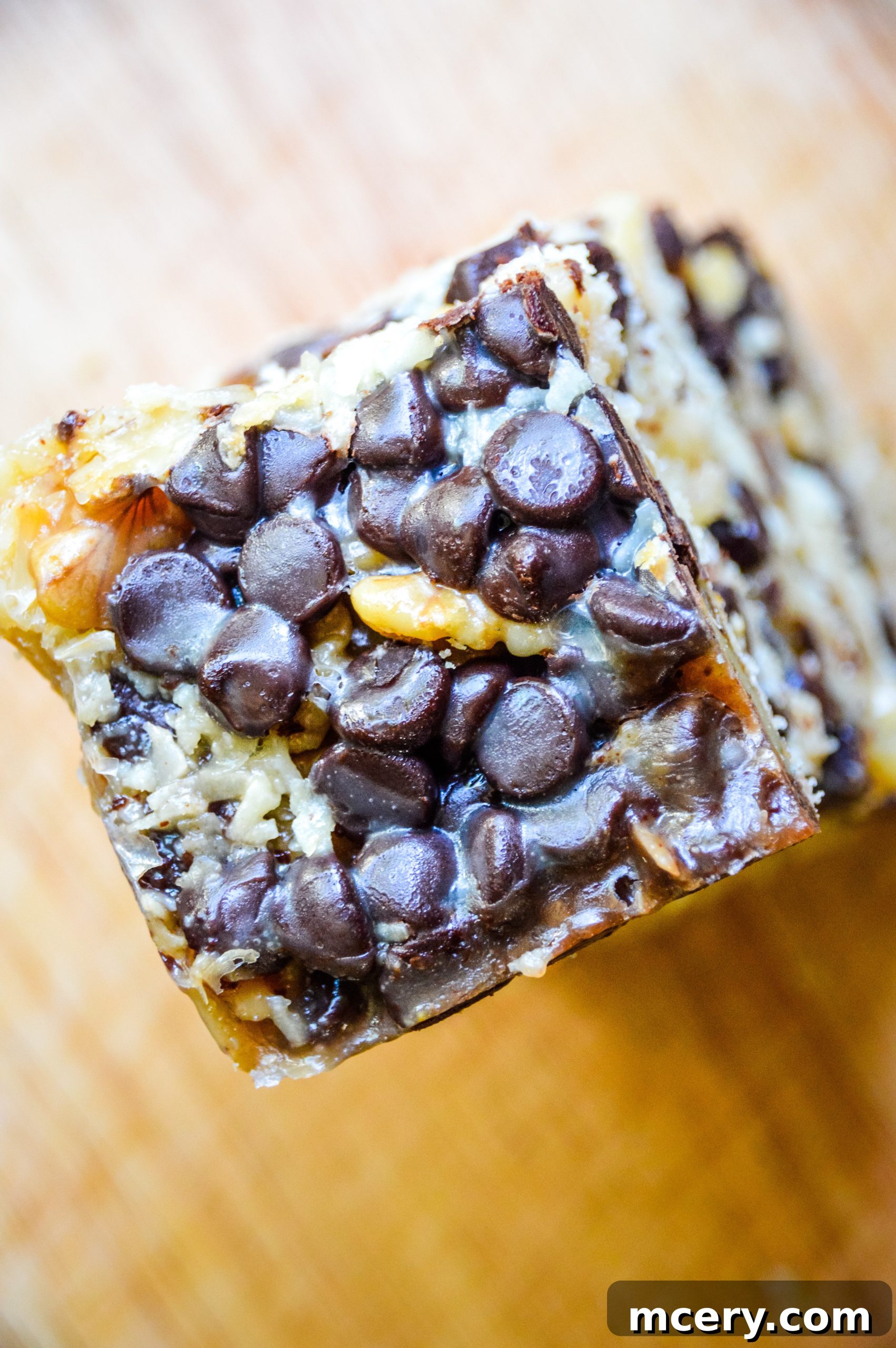 Freshly baked Magic Cookie Bars, showing the rich, gooey layers