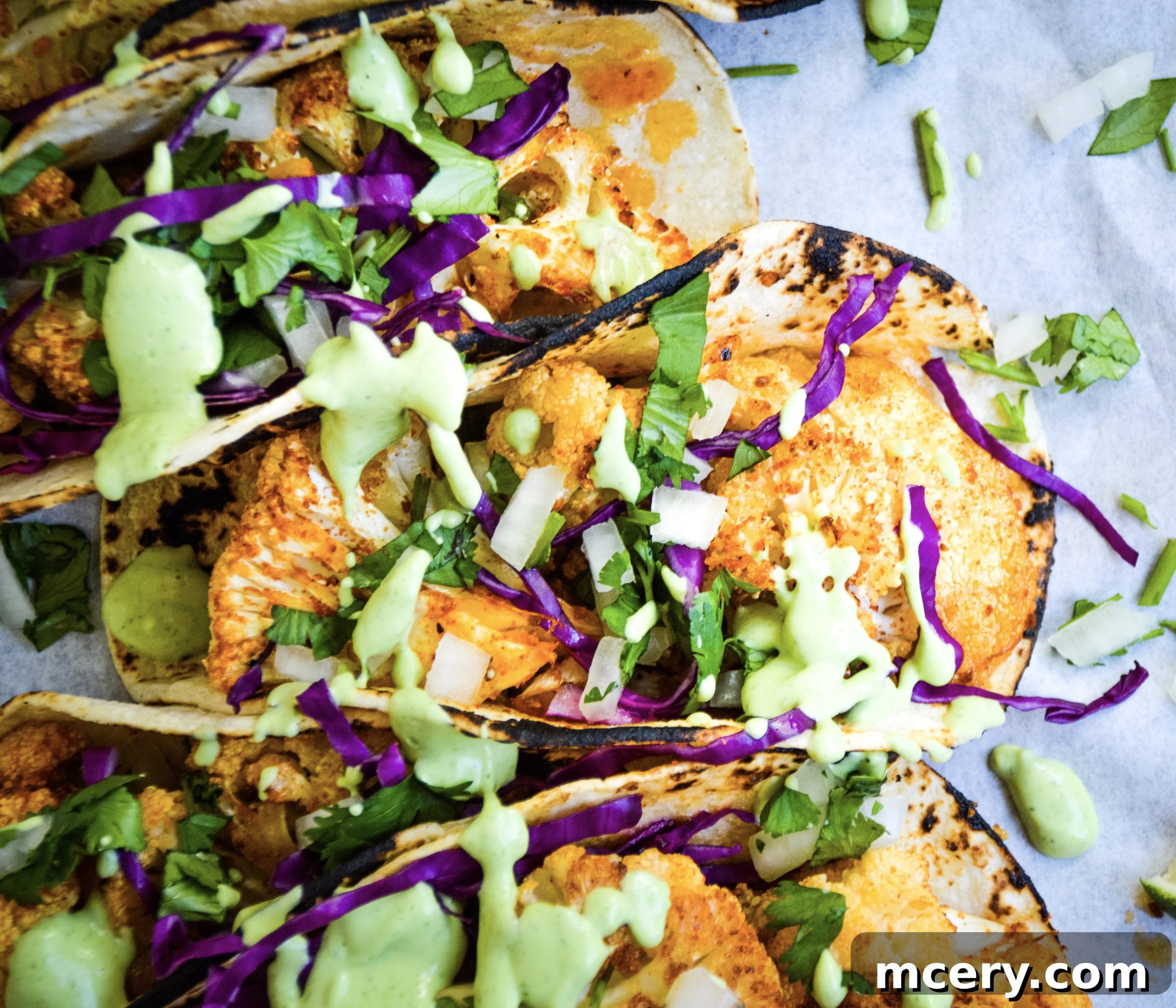 Another view of the creamy cilantro-lime sauce in a bowl, highlighting its smooth texture and rich green color.