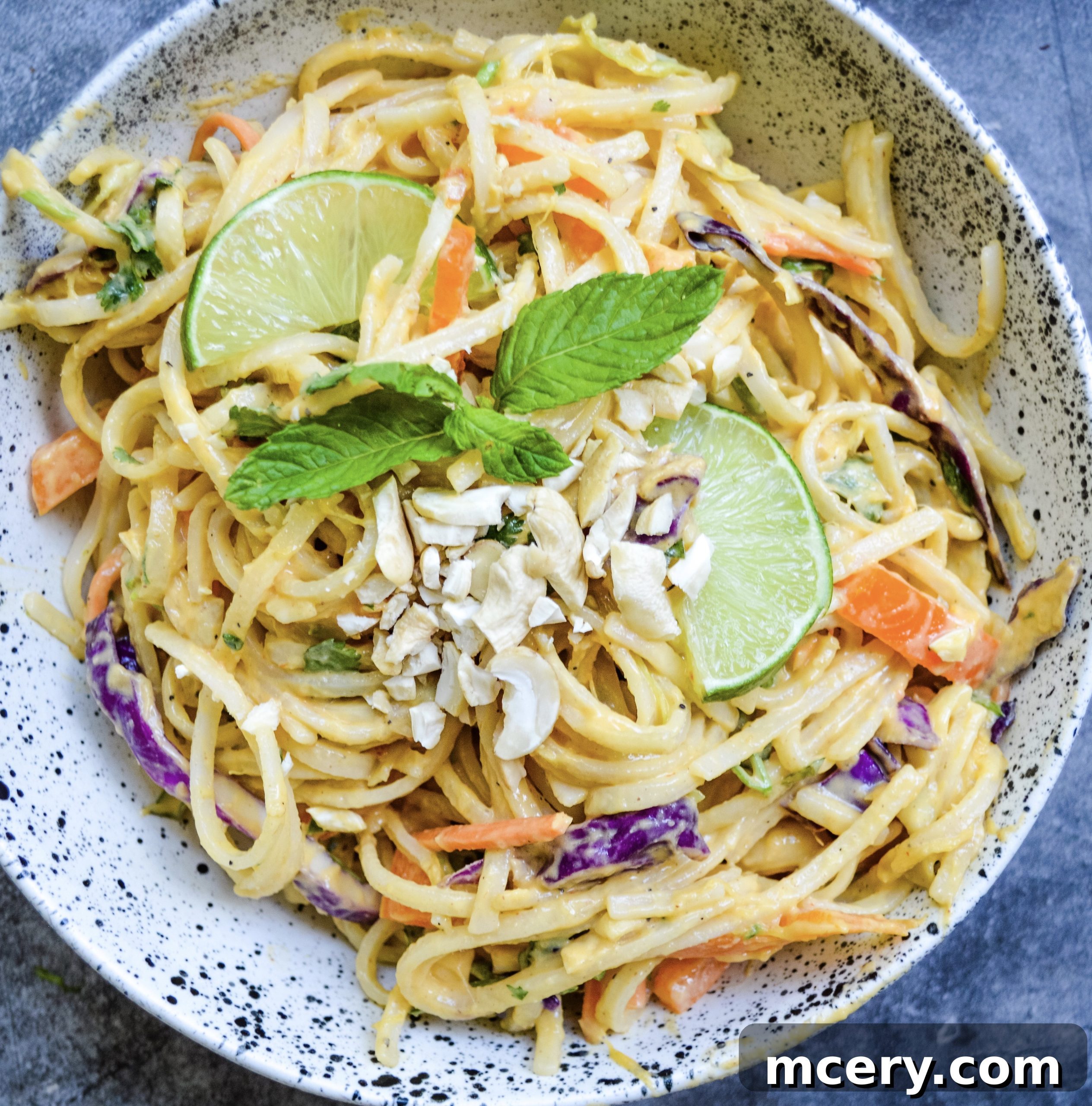 Fresh Ingredients for Thai Noodle Salad Overhead shot of freshly prepared Thai Noodle Salad ingredients mixed together in a large bowl, before the peanut sauce is added, showing the freshness of the vegetables and noodles.