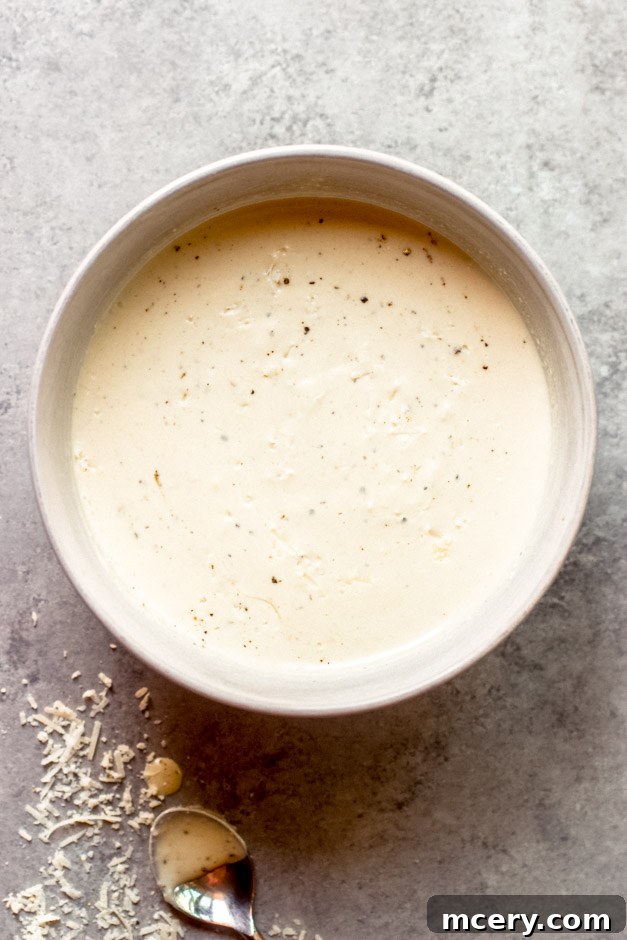 Creamy Greek Yogurt Caesar 5 yogurt caesar dressing in a bowl