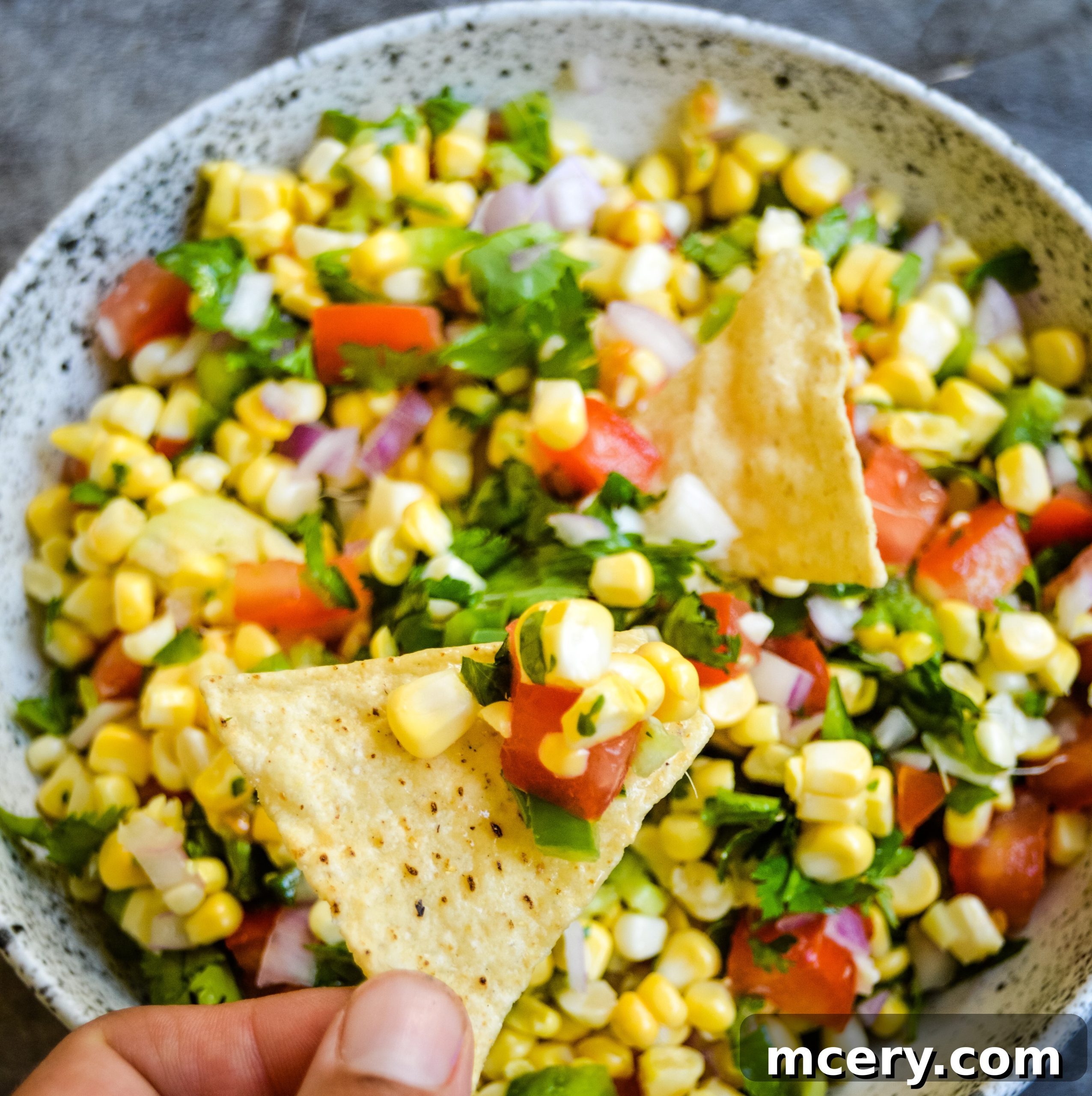 Sunshine Corn Salsa 3 Another angle of fresh corn salsa in a white bowl, ready to be served.
