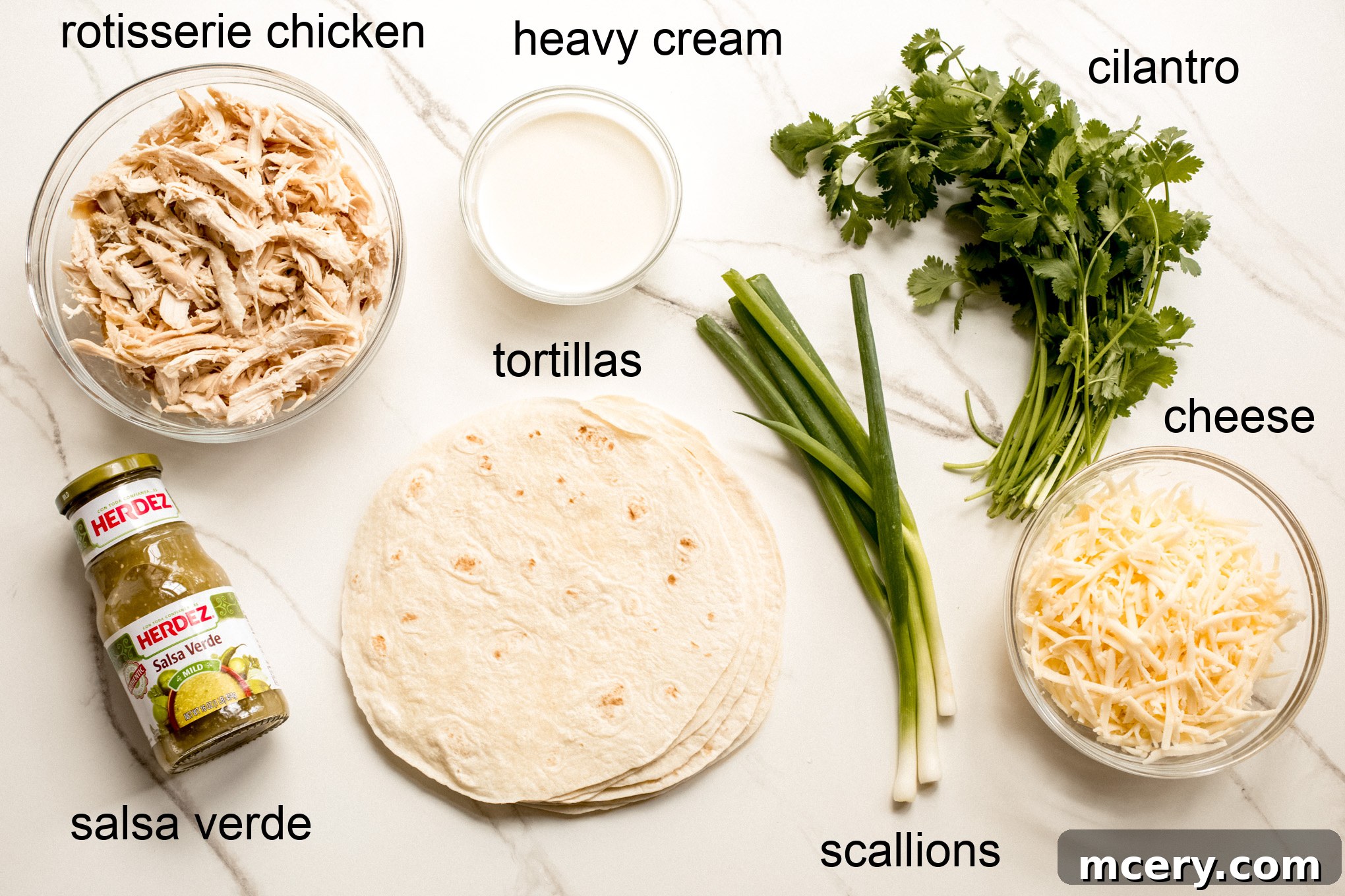 Ingredients laid out for making enchiladas verdes.