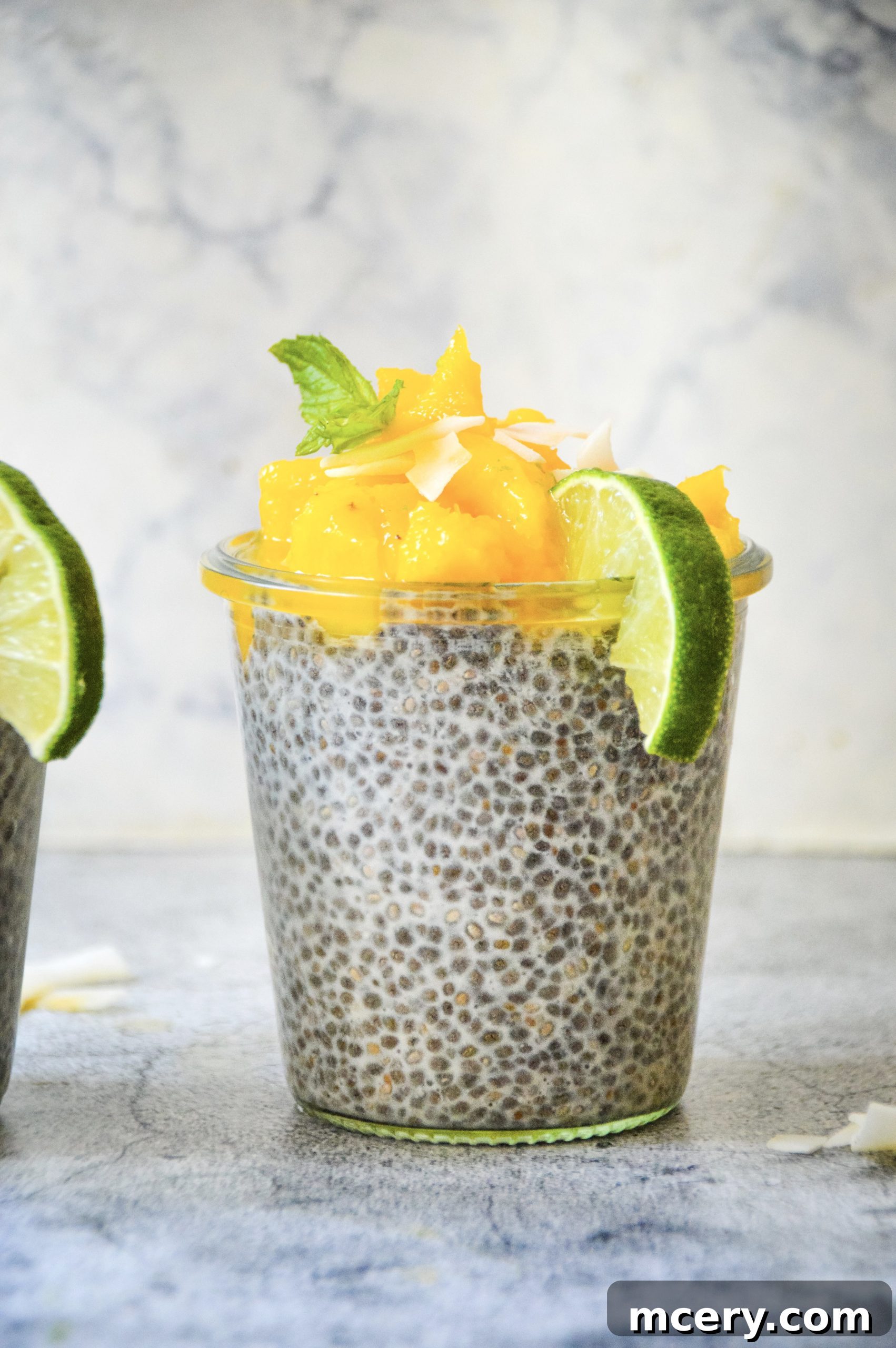 Sunshine Mango Lime Chia Pudding 3 Close-up shot of Mango Lime Chia Pudding, showcasing its creamy texture and vibrant mango layer.