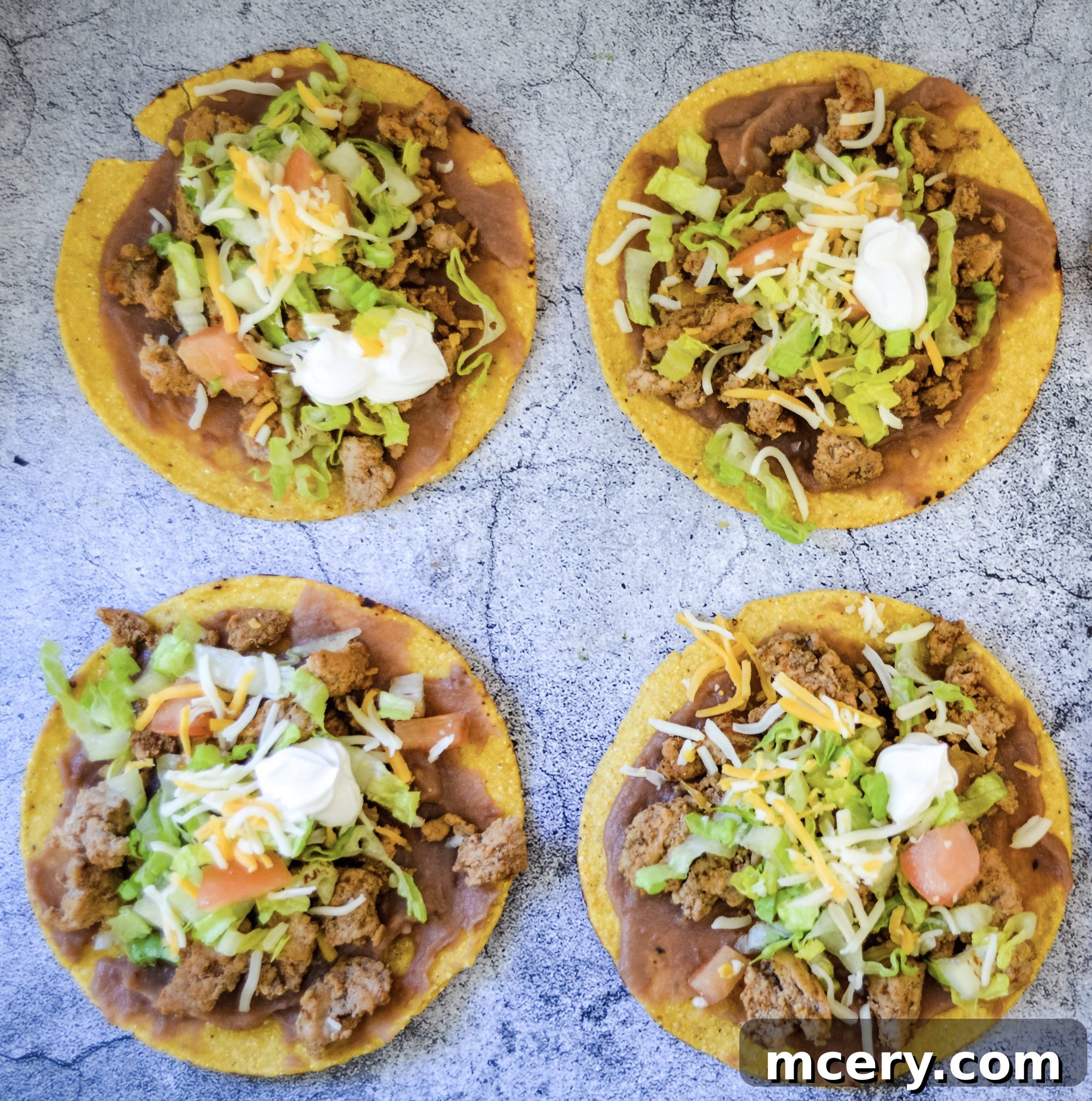 Crispy Tostadas in 15 Minutes 3 Various fresh toppings for tostadas including lettuce, tomatoes, and cheese