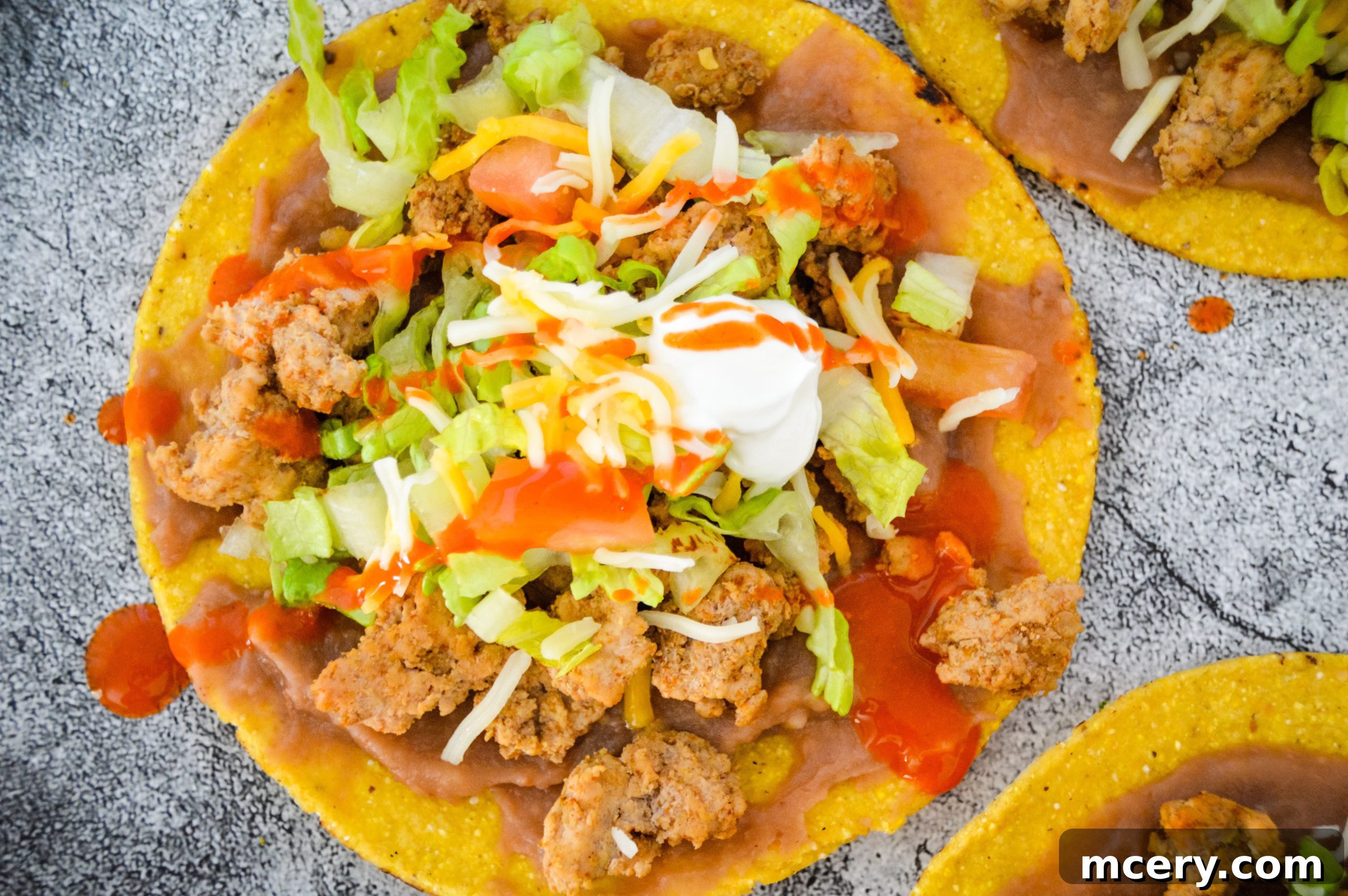 Crispy Tostadas in 15 Minutes 6 A fully assembled tostada with all toppings, ready to eat