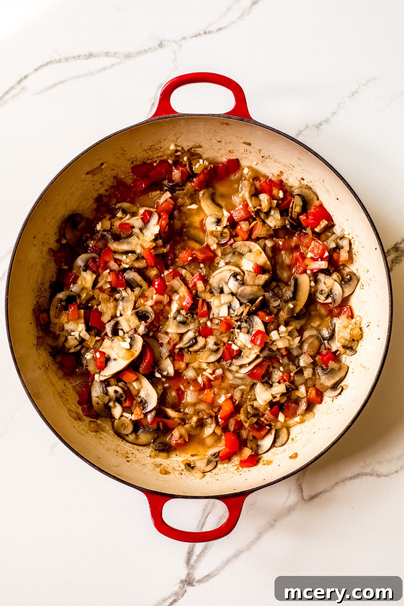 Hearty Italian Sausage and Pepper Skillet 7 cooked vegetables in a saute pan.