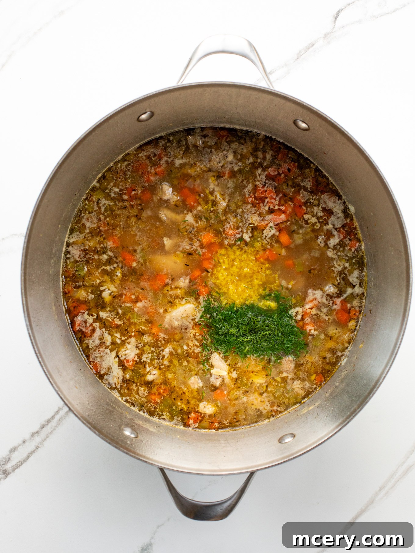 Hearty Chicken Orzo Soup 7 cooked orzo soup with fresh lemon zest and dill.