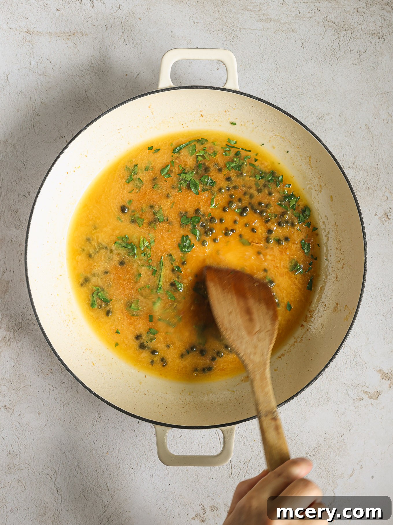Zesty Lemon Piccata Chicken 10 sauce with capers and fresh parsley.