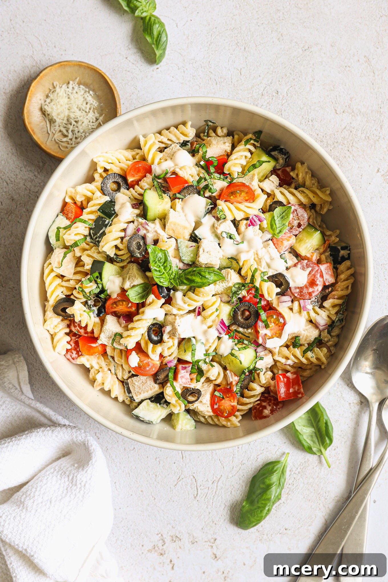 Flavorful Chicken Pasta Salad 9 pasta salad with chicken in a white bowl.