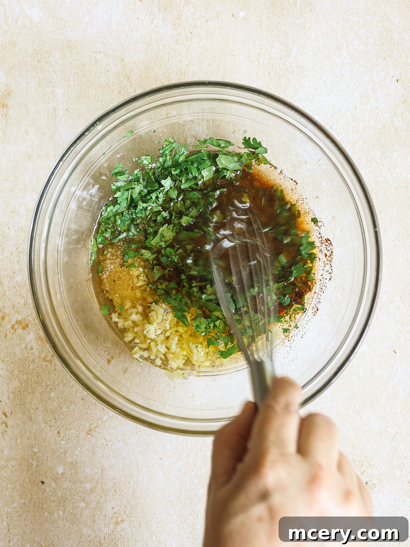 Vibrant Mexican Chicken Marinade 4 chicken marinade ingredients in a glass bowl.