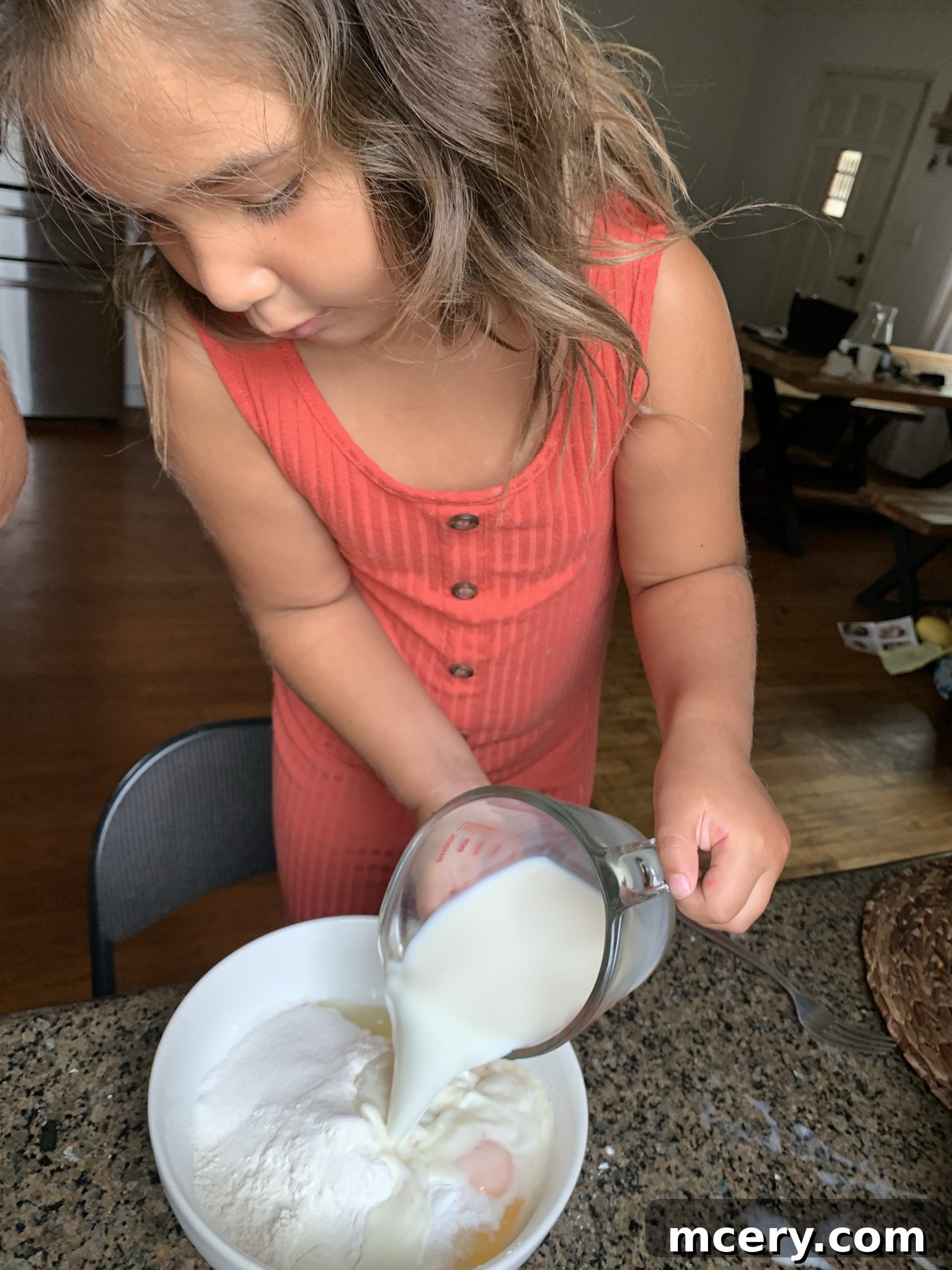 Celebrating Dads 4 A candid shot of Fiori helping in the kitchen, preparing Father's Day brunch with her mom.