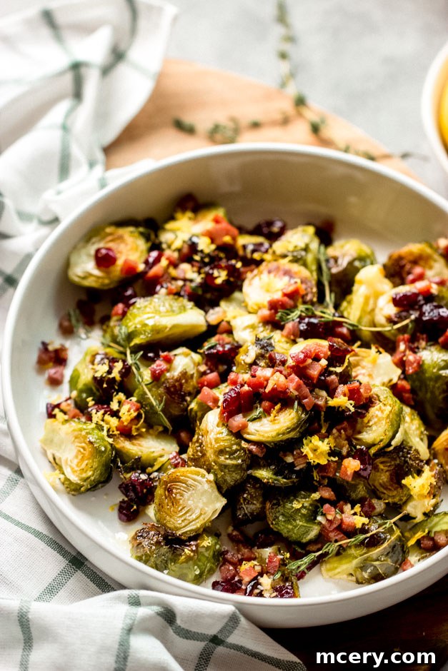 Crispy Prosciutto & Sweet Cranberry Roasted Brussels 8 side view lemon roasted brussel sprouts with cranberries and prosciutto