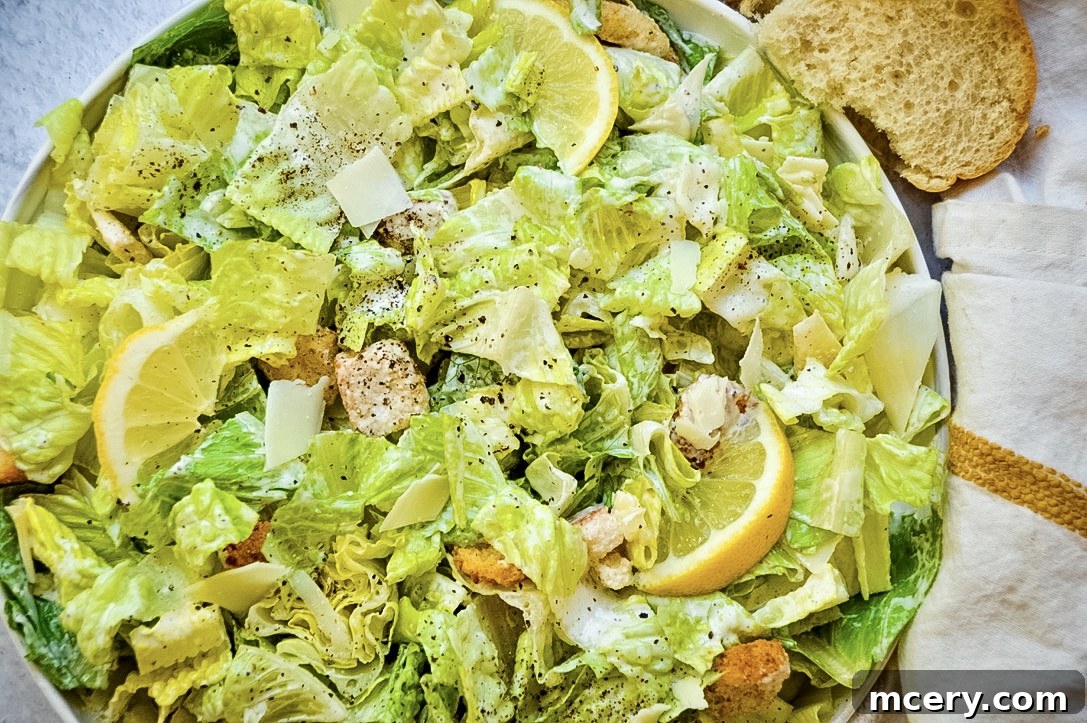 A vibrant bowl of Classic Caesar Salad with fresh romaine, croutons, and cheese.