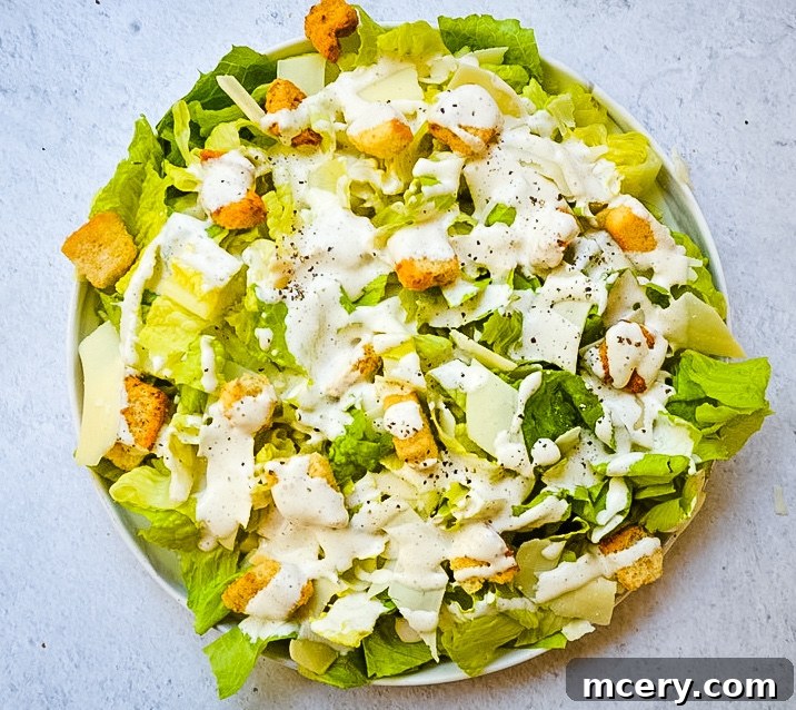 Close-up of fresh romaine lettuce, a key ingredient for Caesar salad.