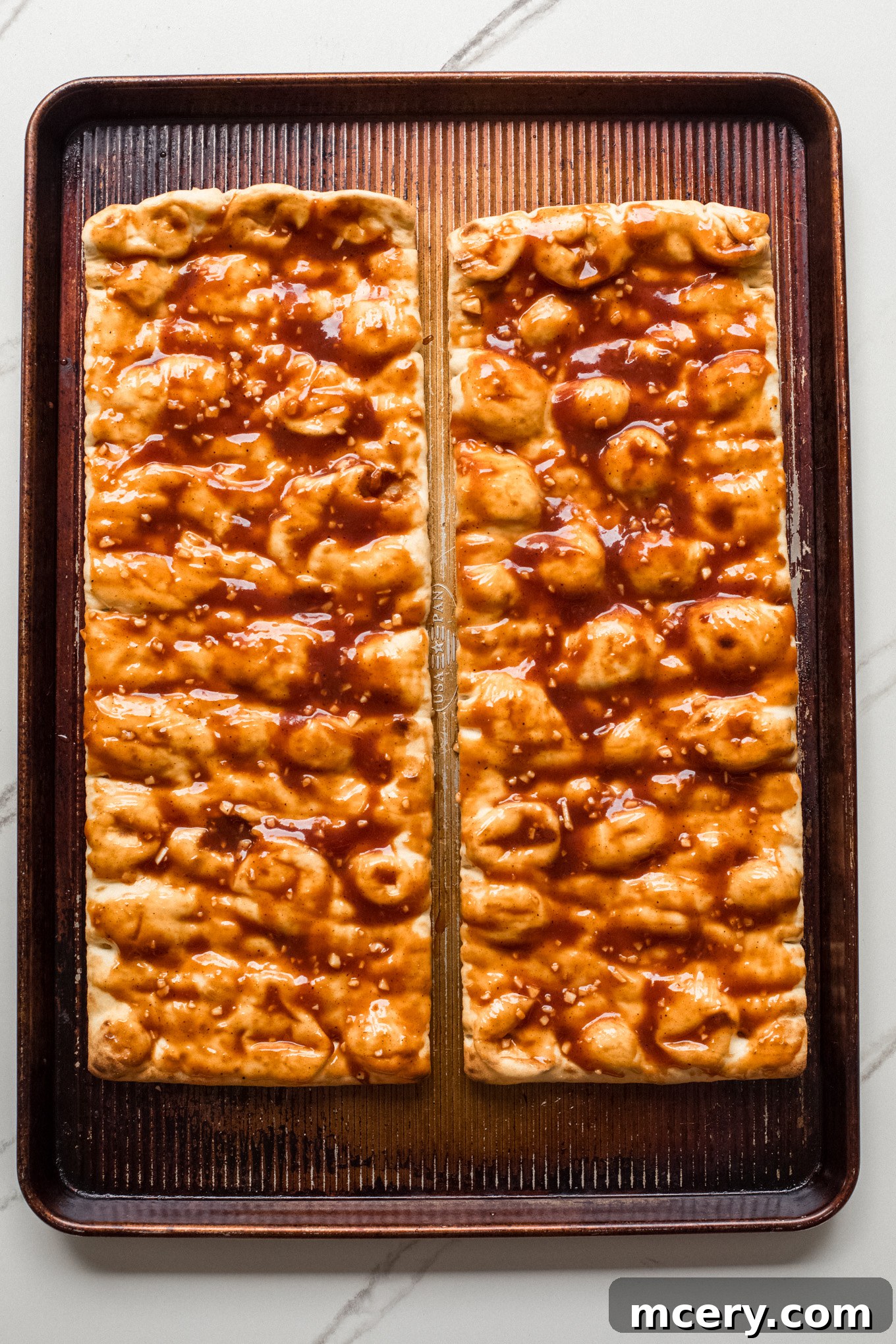 Smoky BBQ Chicken Flatbread 6 Flatbread placed on a baking sheet and brushed with the remaining BBQ sauce.