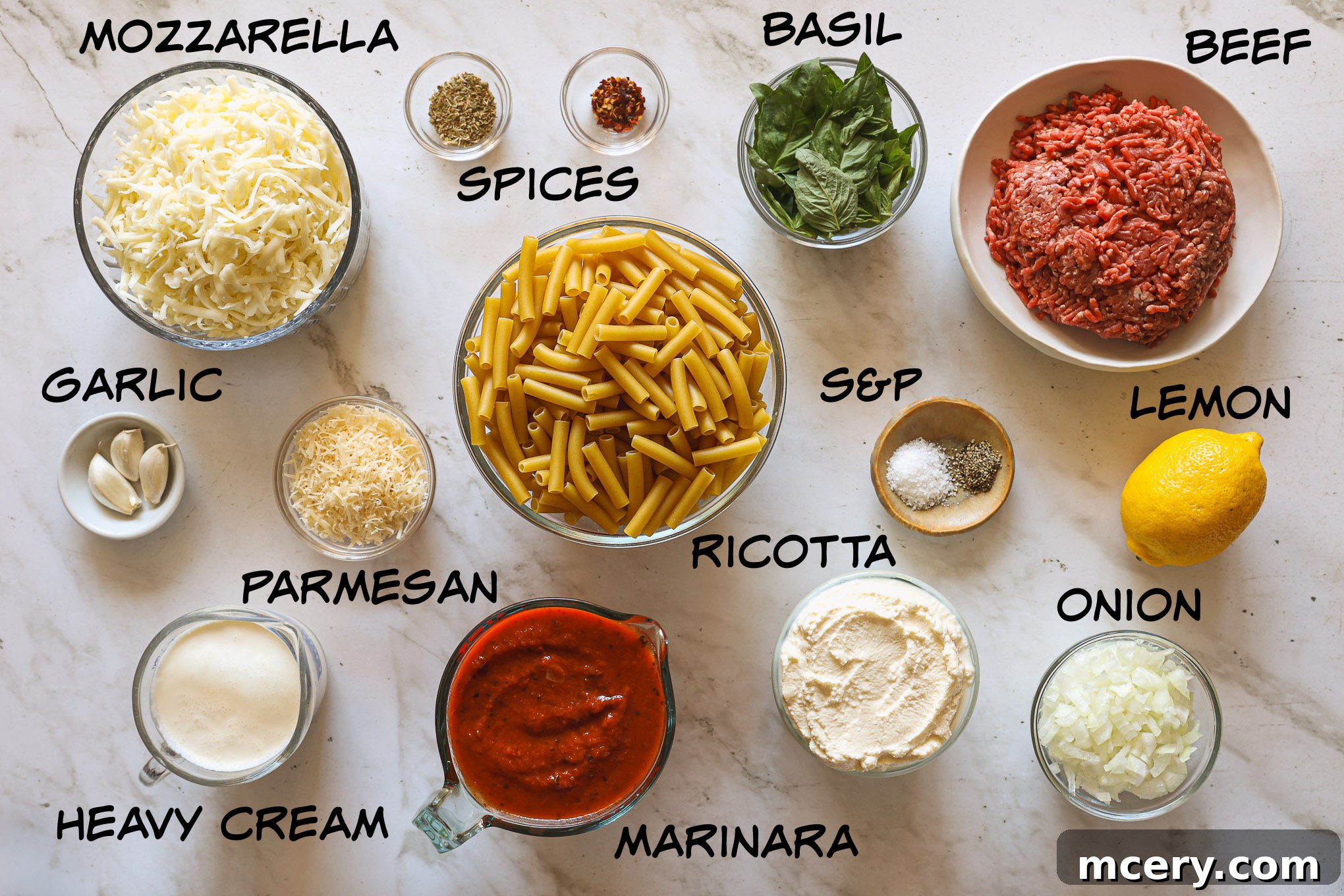 Golden Baked Ziti Delight 3 All the fresh ingredients laid out for making baked ziti, including pasta, ground beef, vegetables, herbs, and cheeses.