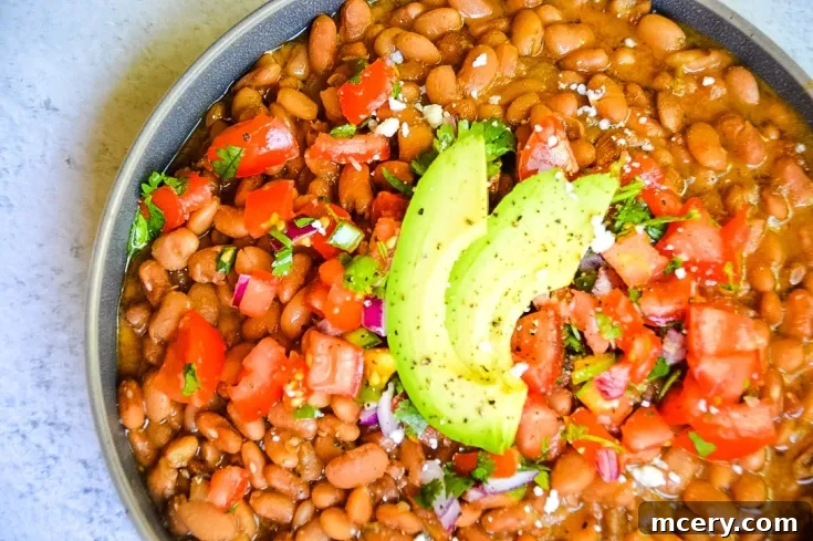 Speedy & Savory Instant Pot Pinto Beans 7 A visual cue for sharing or pinning the recipe, showing a rustic food image.
