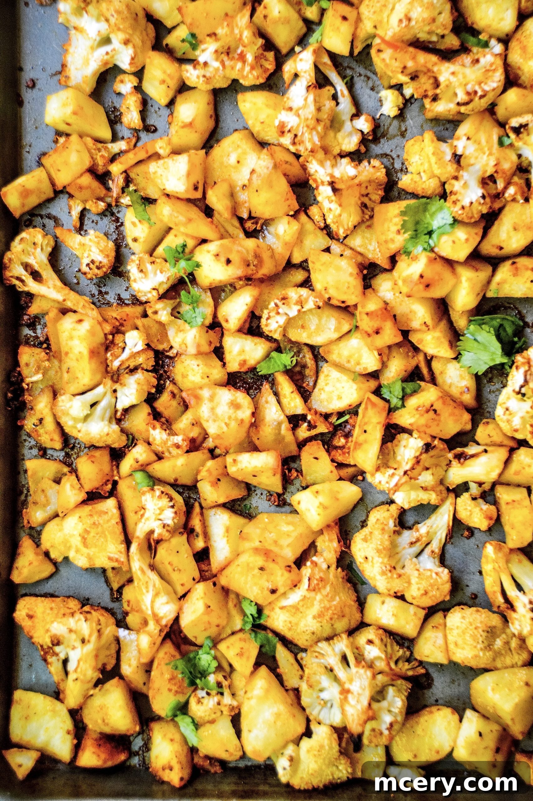 Taco Roasted Cauliflower and Potatoes with a Creamy Dip 2 Sheet Pan Taco Spiced Cauliflower & Potatoes, a vibrant and healthy plant-based meal