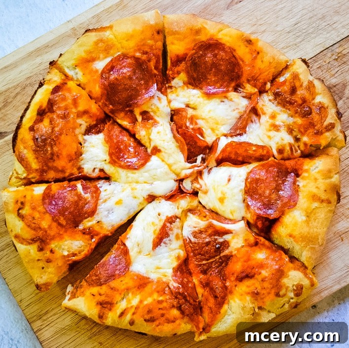 Overhead shot of various homemade pizzas with different toppings, showcasing the delicious possibilities.