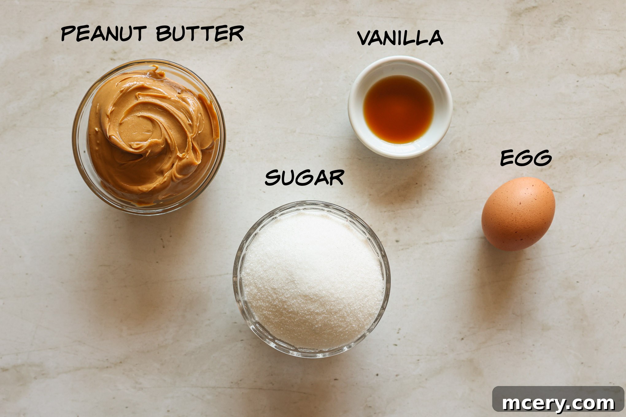 Effortless 4-Ingredient Peanut Butter Cookies 3 The four simple ingredients for easy peanut butter cookies: creamy peanut butter, sugar, an egg, and vanilla extract.
