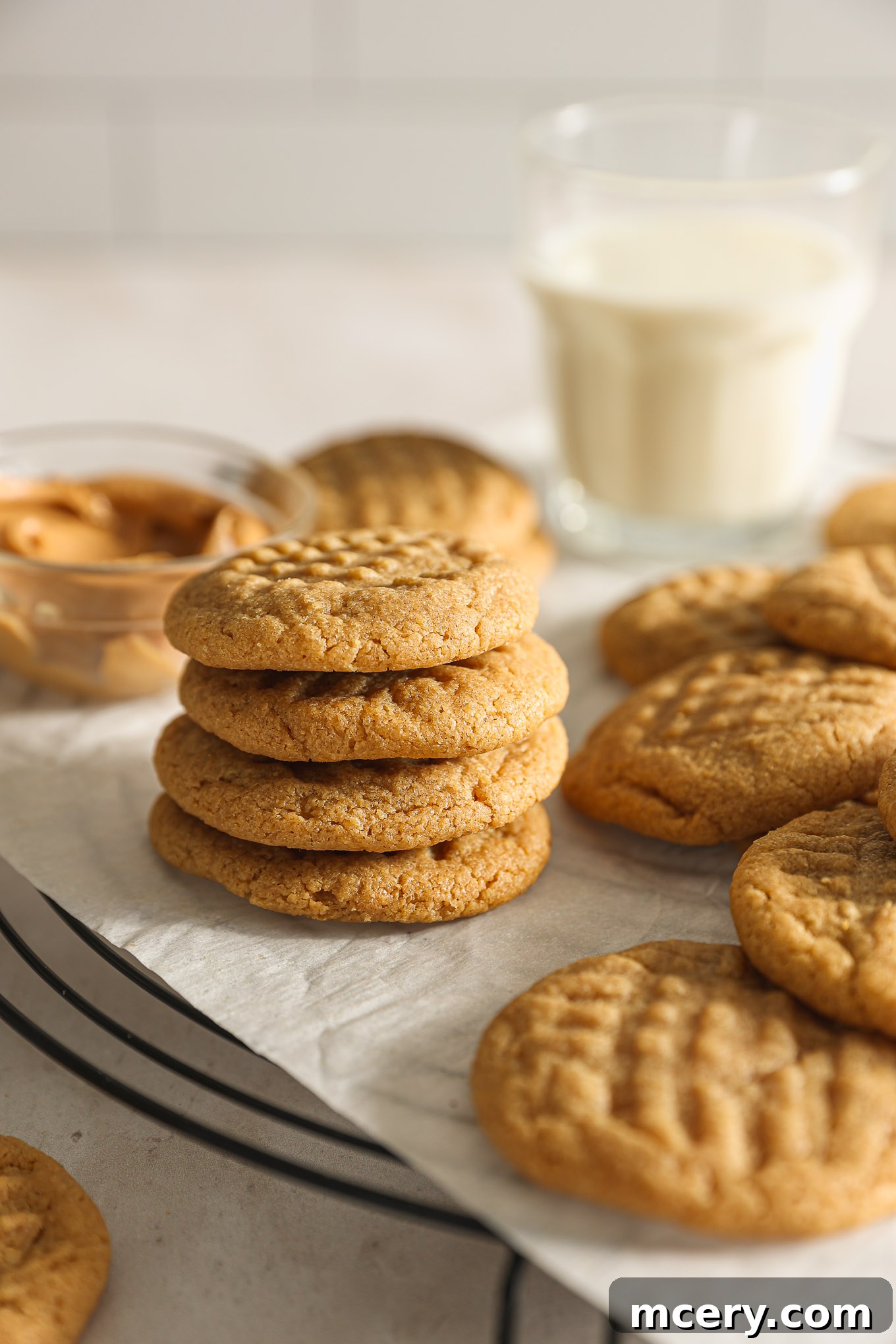 Effortless 4-Ingredient Peanut Butter Cookies 8 A stack of delicious 4-ingredient flourless peanut butter cookies, ready to be enjoyed.