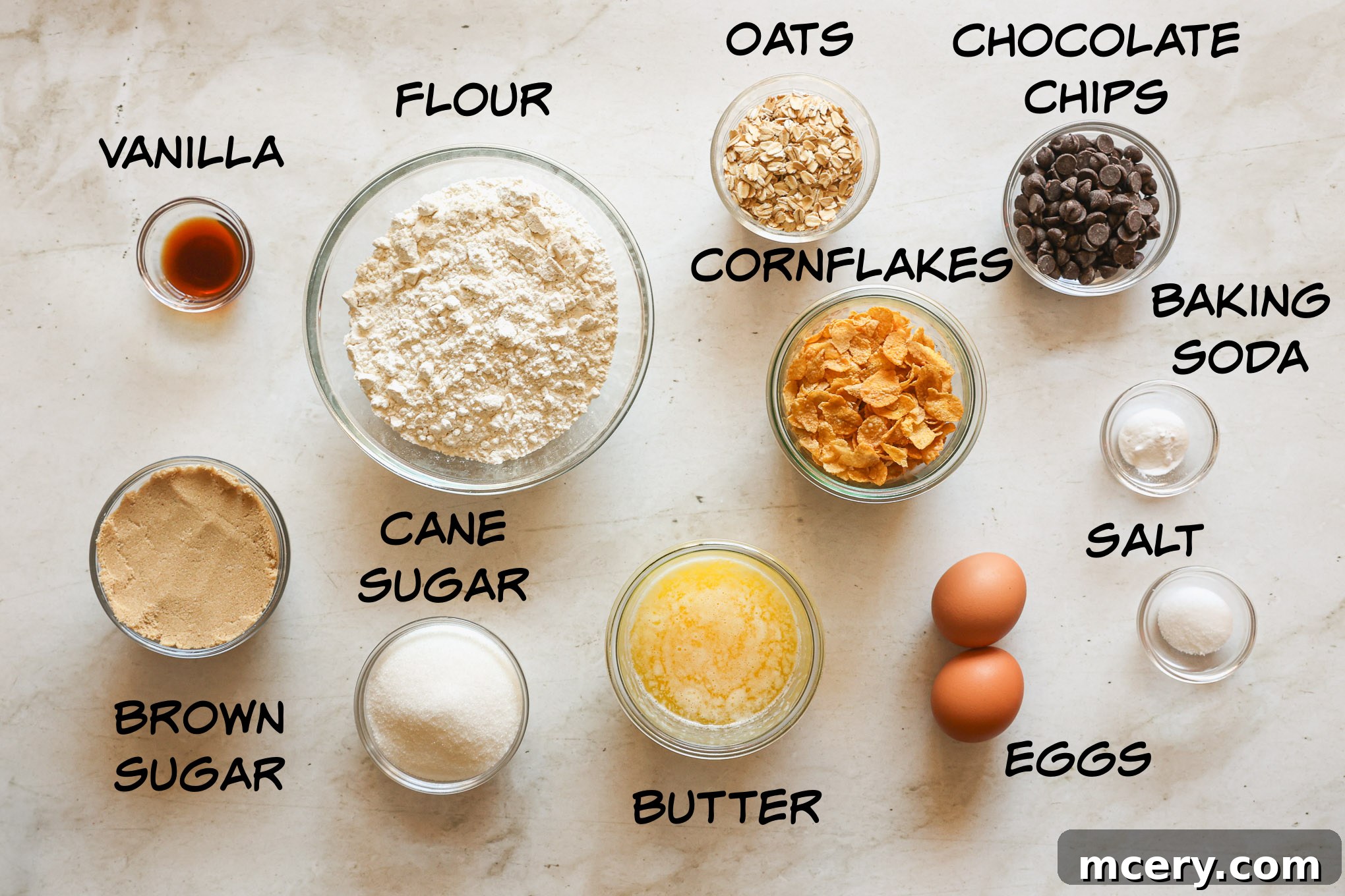 No-Bake Crispy Cornflake Treats 3 A flat lay photograph showcasing all the fresh ingredients needed to bake old fashioned cornflake cookies.