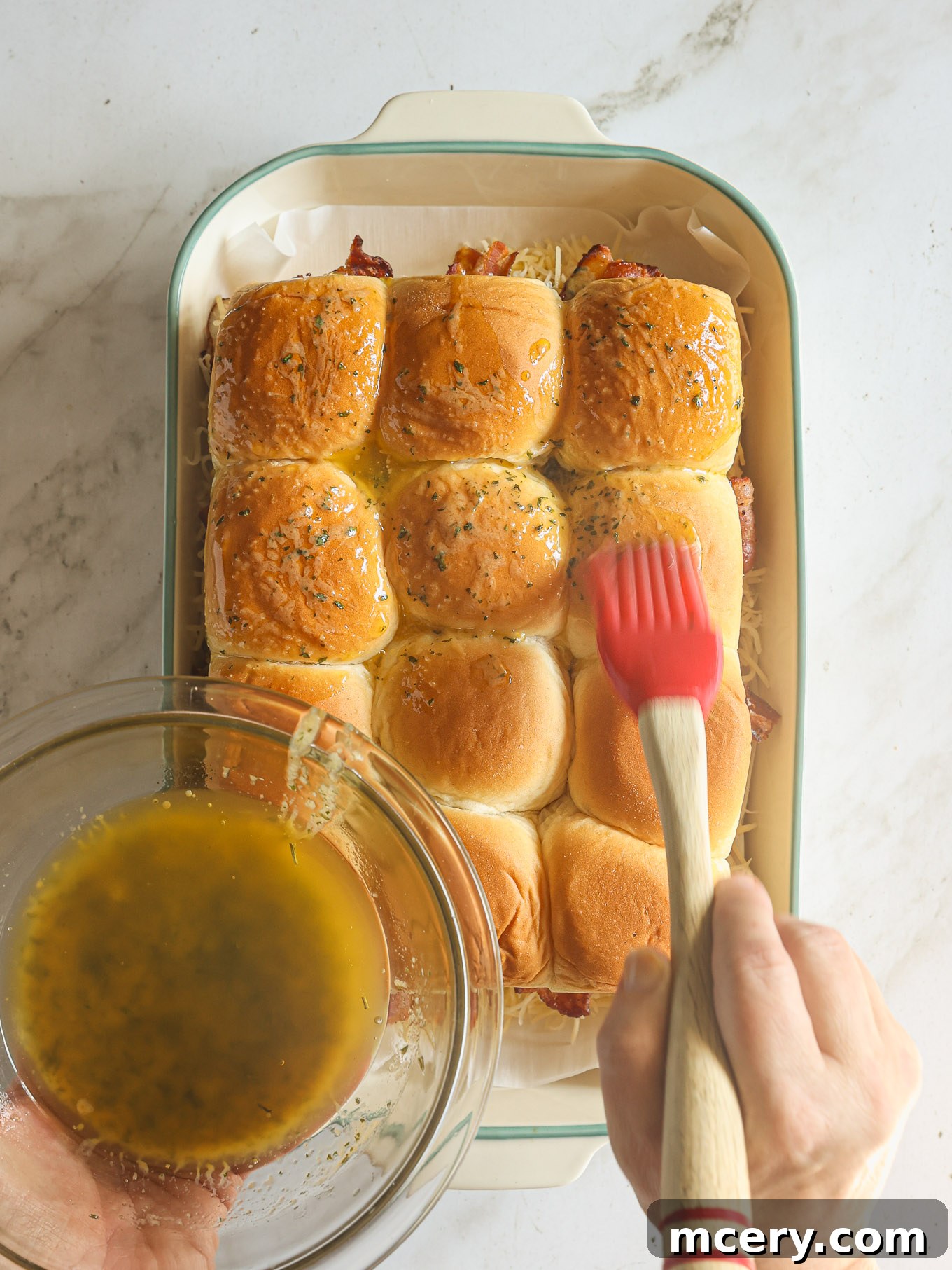 butter brushed on hawaiian rolls.