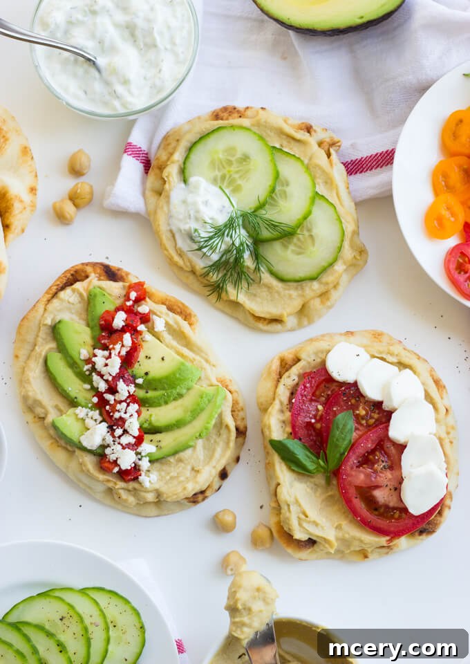 Easy Hummus Naan Toasts: 3 Delicious Variations 8 A final vibrant shot of a finished hummus mini naan toast, showcasing its appeal and deliciousness.