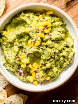 guacamole with mango chunks
