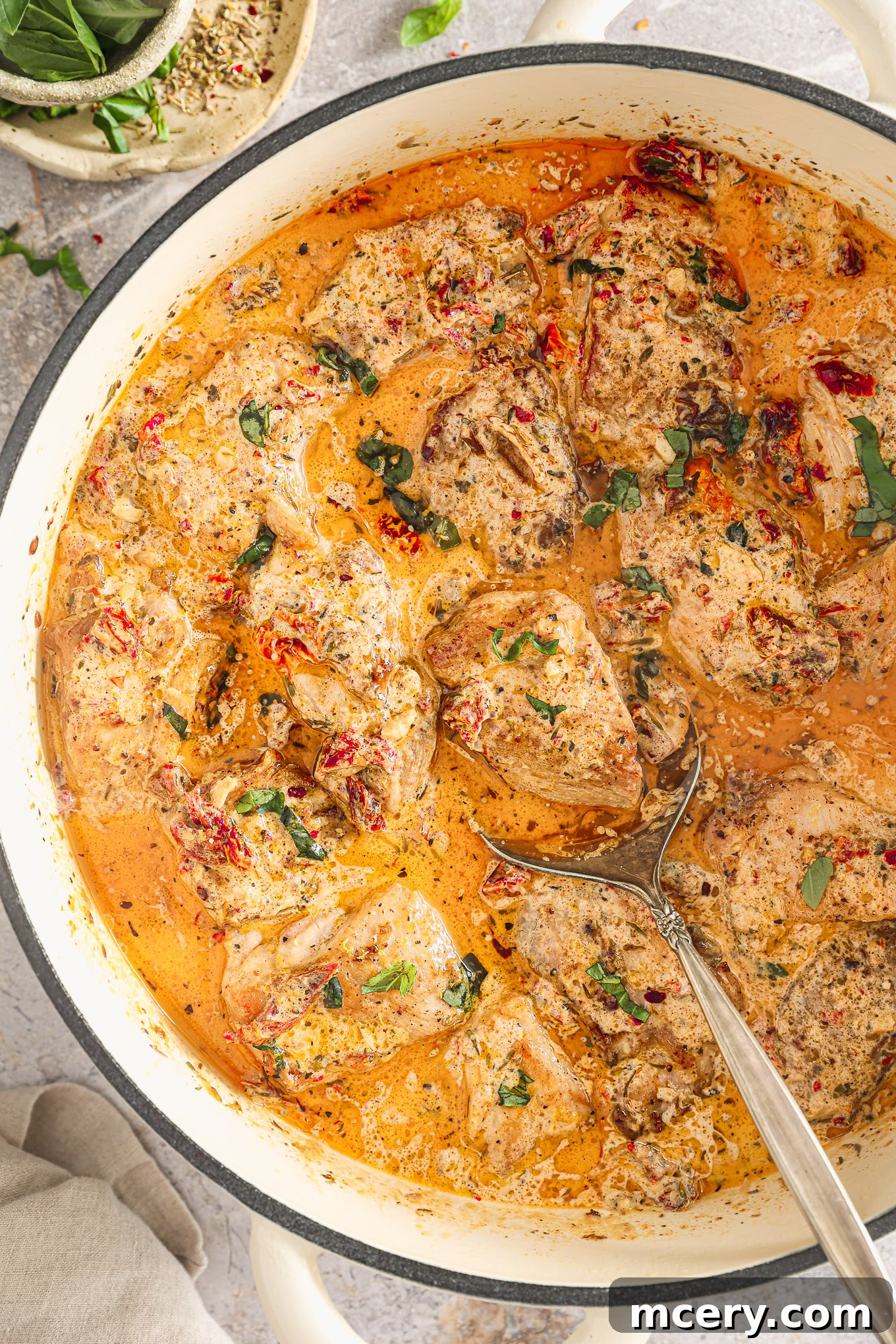Your Guide to Perfect Marry Me Chicken 10 chicken in cream sauce in a skillet.