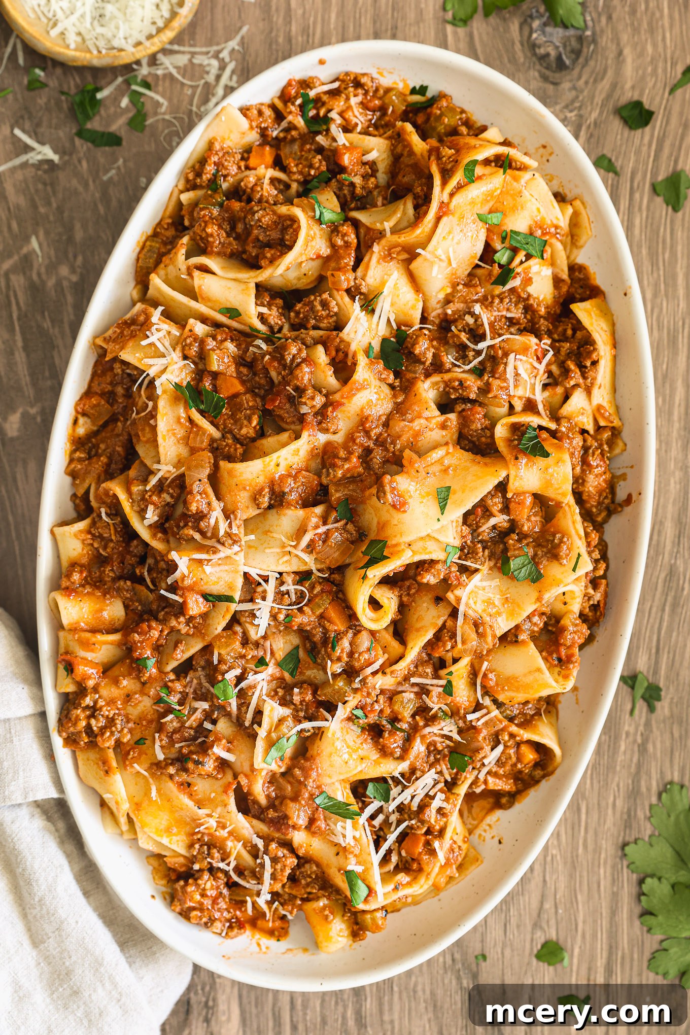 Classic Hearty Bolognese Pasta 2 pasta bolognese in oval platter.