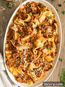 pasta bolognese in oval platter.
