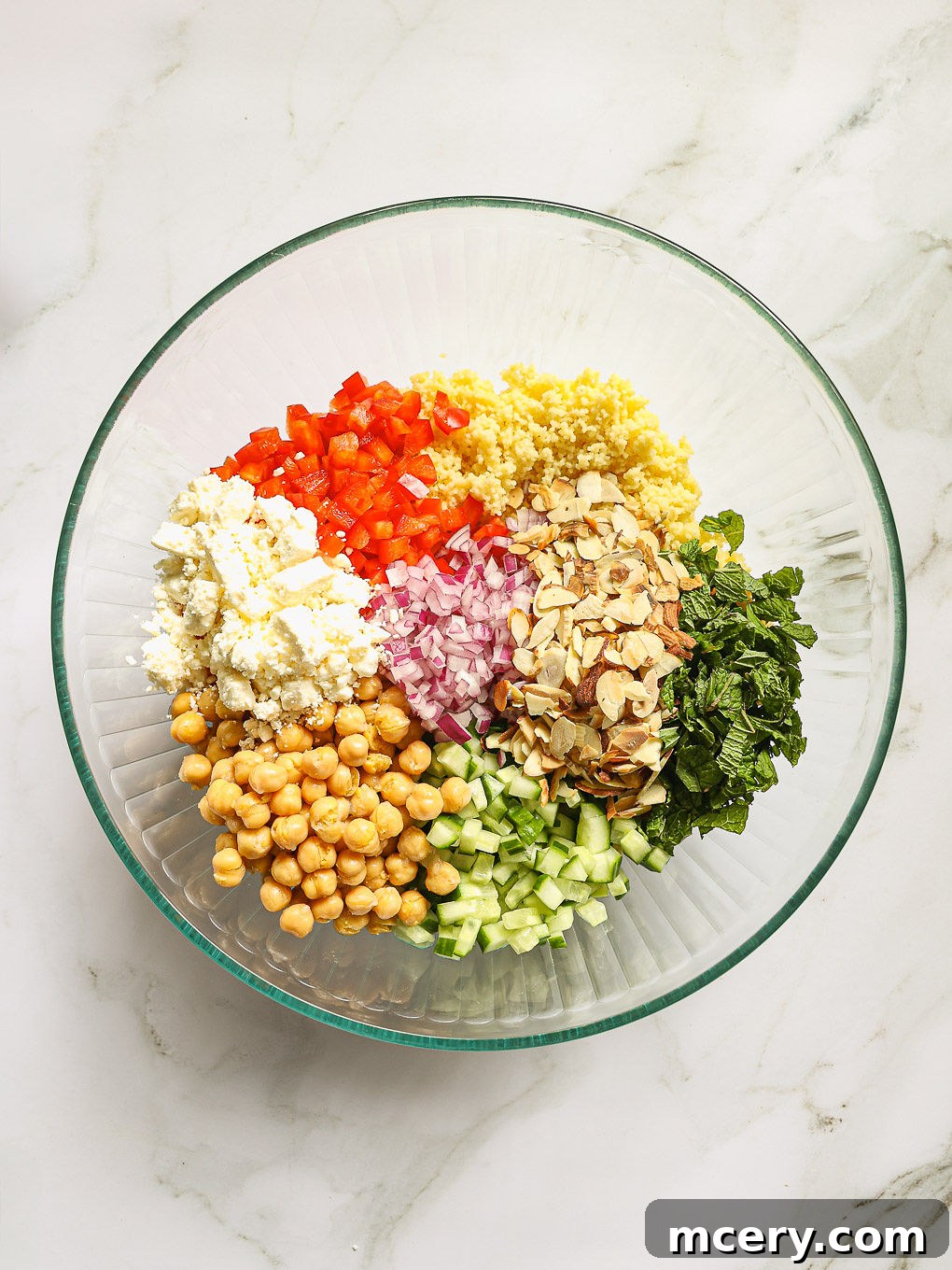 ingredients for salad in a glass bowl.