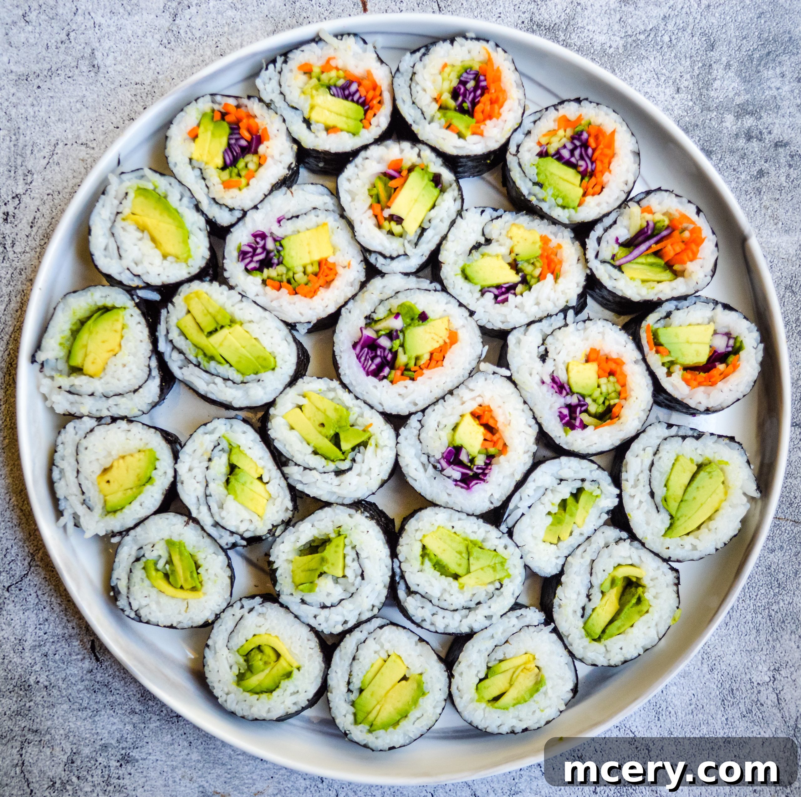 Kaleidoscope Sushi Rolls 7 Various angles of delicious Rainbow Veggie Sushi Rolls, ready to be enjoyed.