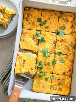 Overnight Southwest Fiesta Bake 11 overhead of egg casserole with sausage and peppers.