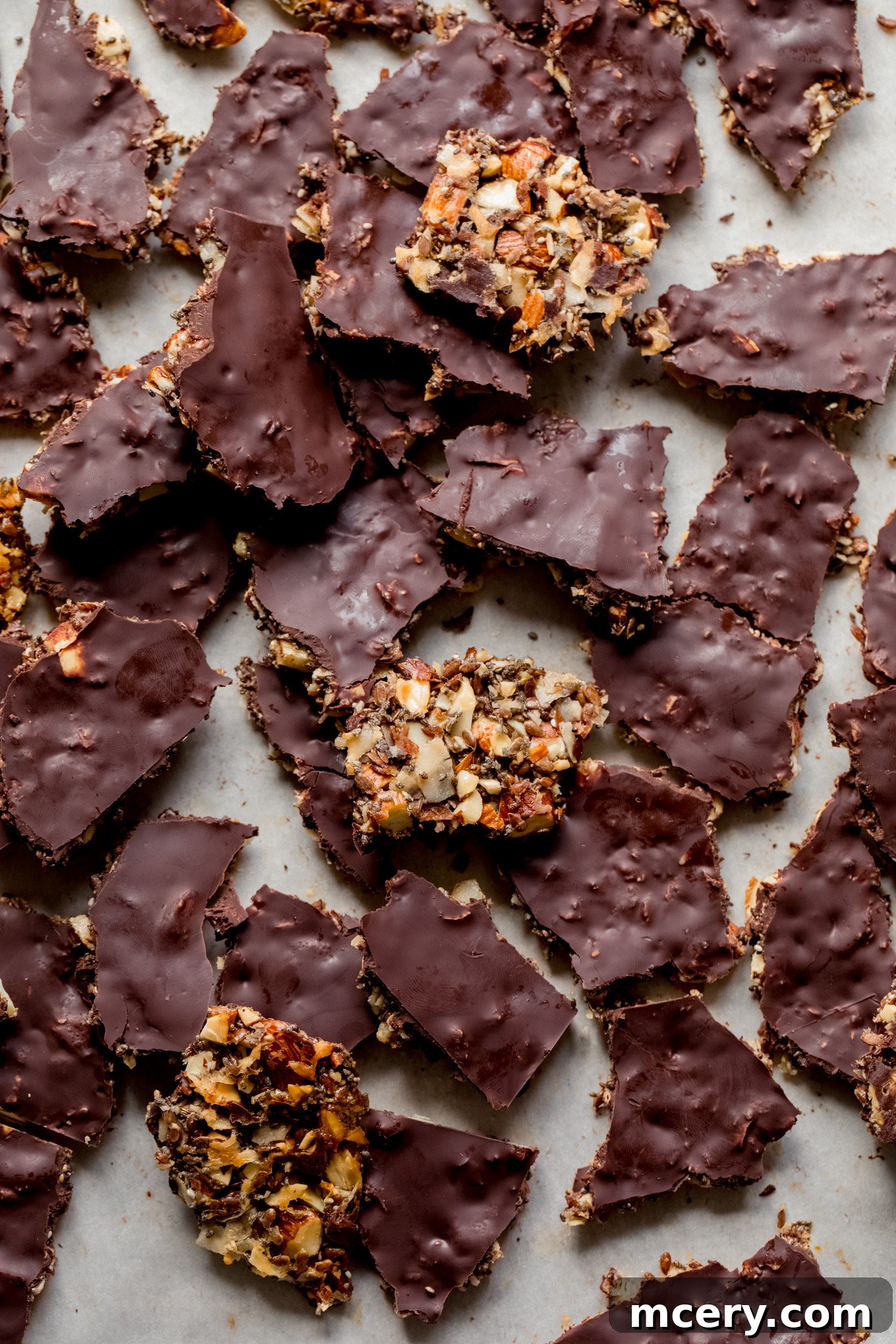 Midnight Almond Bark 8 A large sheet of homemade dark chocolate almond bark, fully set and ready to be broken into pieces.