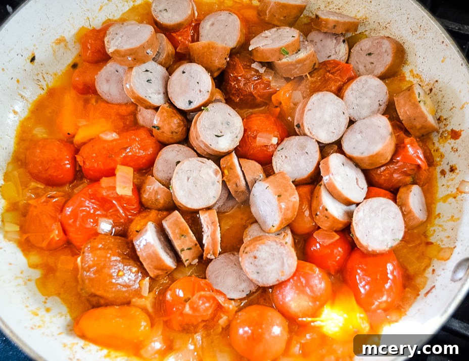 Hearty Tomato Spinach and Sausage Pasta 6 An inviting close-up of Tomato Spinach and Sausage Pasta, highlighting the perfect blend of ingredients and rich sauce.