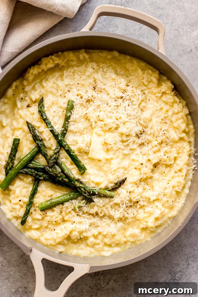 Vibrant Lemon Asparagus Risotto 2 Creamy lemon asparagus risotto in a bowl, garnished with fresh herbs