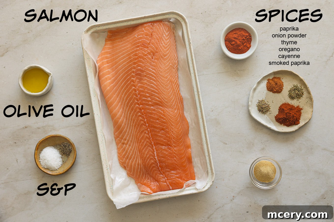 Unlock the Flavor Mastering Blackened Salmon 3 A collection of ingredients for blackened salmon including fresh salmon fillets, various spices, olive oil, and lemons, arranged on a rustic wooden surface.