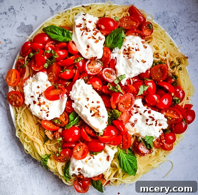 Bruschetta Pasta with Burrata - a vibrant Italian-American main dish from Kay's Clean Eats, showcasing fresh ingredients and creamy burrata cheese.
