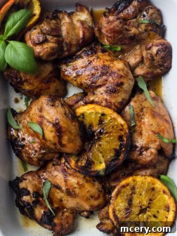 chicken marinated in orange juice, a close-up of raw chicken soaking in marinade