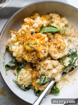 Cauliflower and Spinach Bake (Mac and Cheese) - whether you're trying to sneak more vegetables into your day or cutting down on carbs, this delicious side is the way to go!