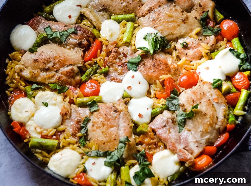 One-Pan Caprese Chicken Orzo Delight 2 Caprese Chicken and Orzo Skillet, fresh and vibrant with basil