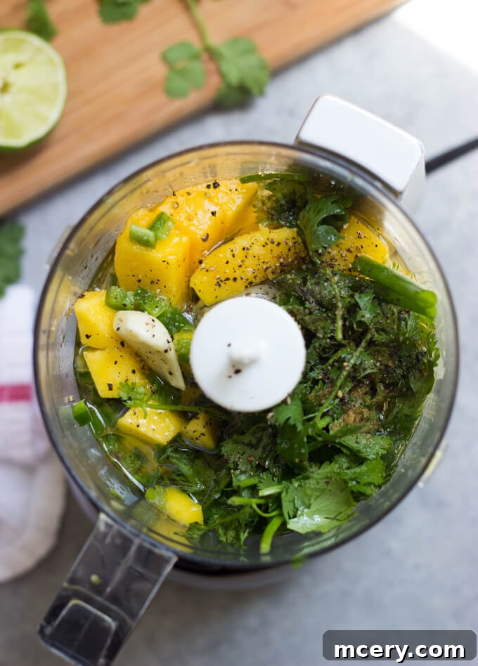 Tropical Mango Drizzle 5 ingredients in a food processor for mango cilantro dressing