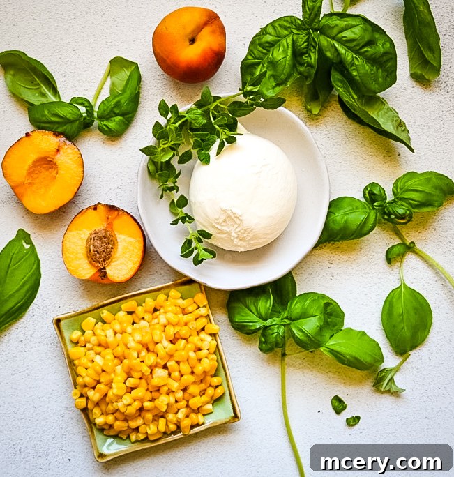 Ingredients for the Peach, Corn & Burrata Salad laid out on a cutting board, including diced peaches, corn kernels, and fresh herbs.