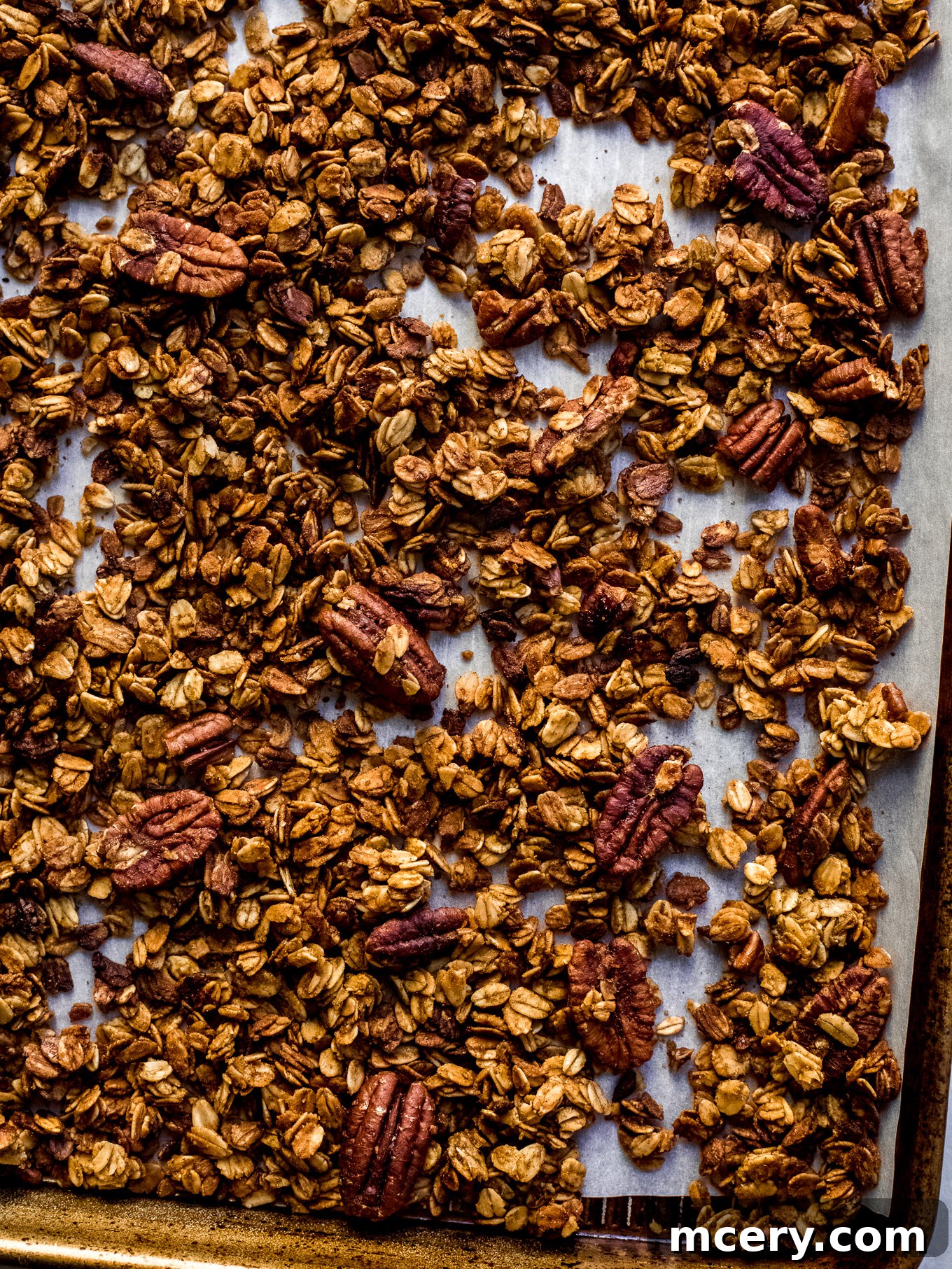 Delicious homemade pumpkin granola with crunchy pecans, ready for a fall breakfast or snack.