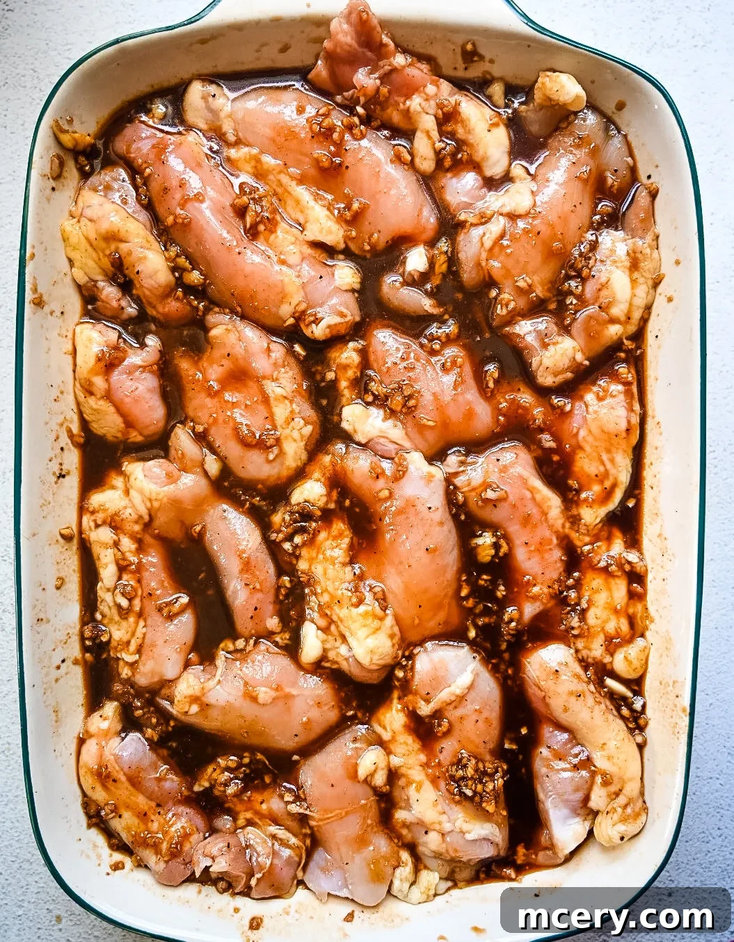 Sticky Garlic Brown Sugar Chicken 5 Garlic brown sugar chicken served over white rice with sauce.