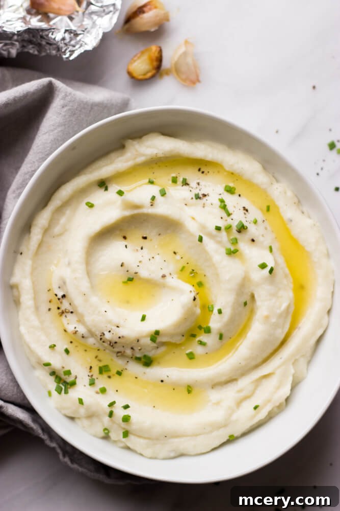 Creamy cauliflower ricotta mash with roasted garlic, a perfect low-carb side dish