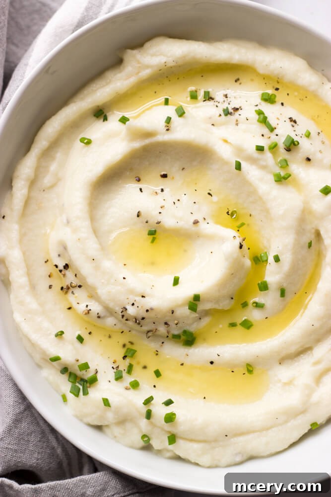Serving of creamy mashed cauliflower with ricotta, ready to enjoy